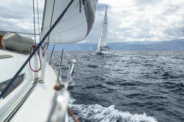 depositphotos_46517797-stock-photo-unidentified-sailboats-participate-in-sailing